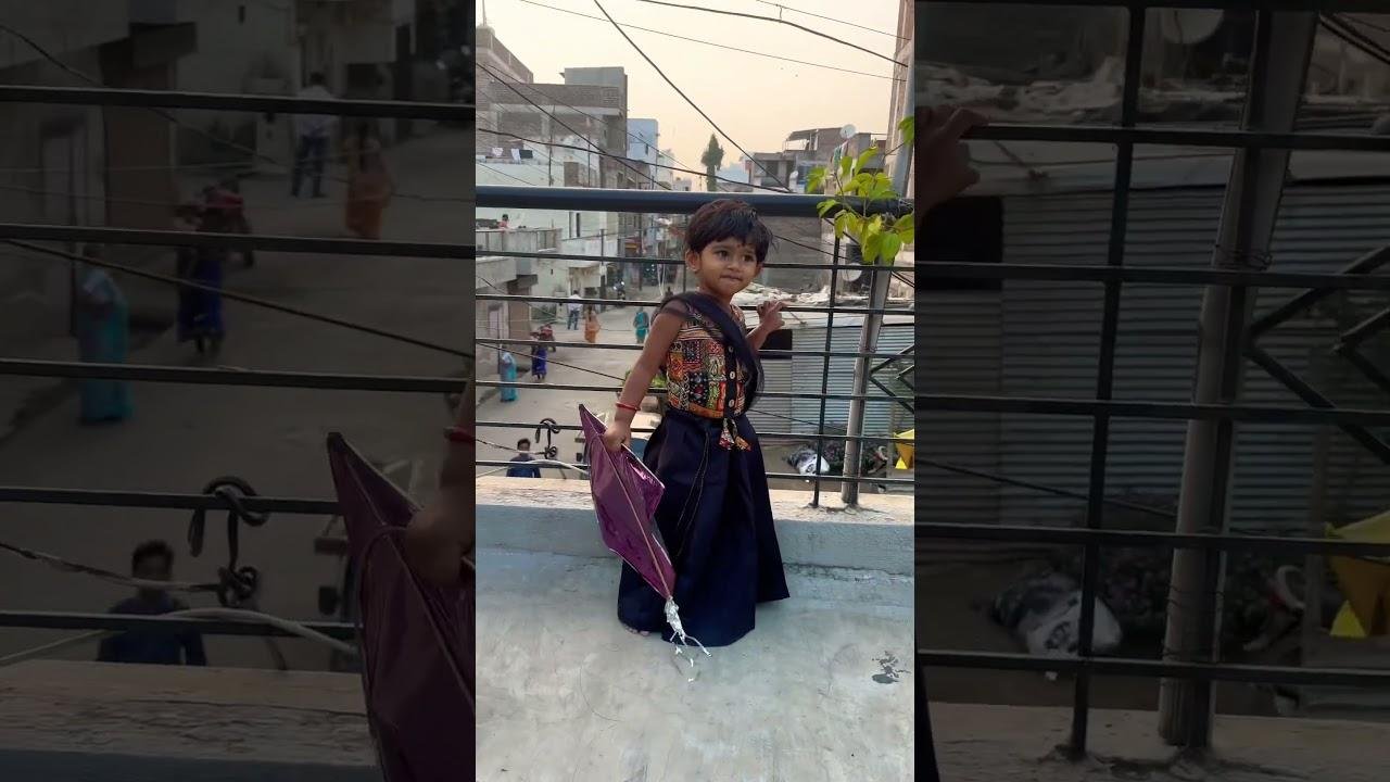 sharvi kite udavat aahe #kite #shortsfeed #kaathumelasong #viralvideo #kiteflying #sankranti #cute